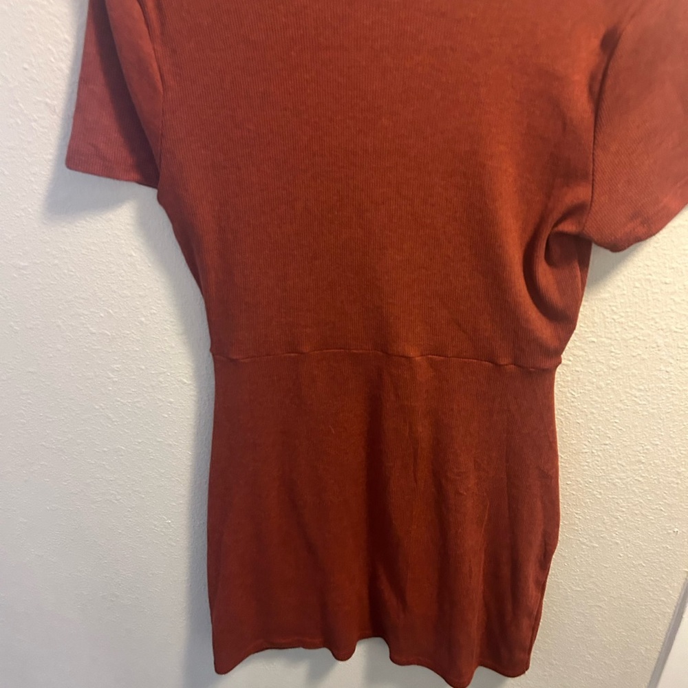 Honey Belle Sweater like material Burnt Orange twist in front mini dress. Size L